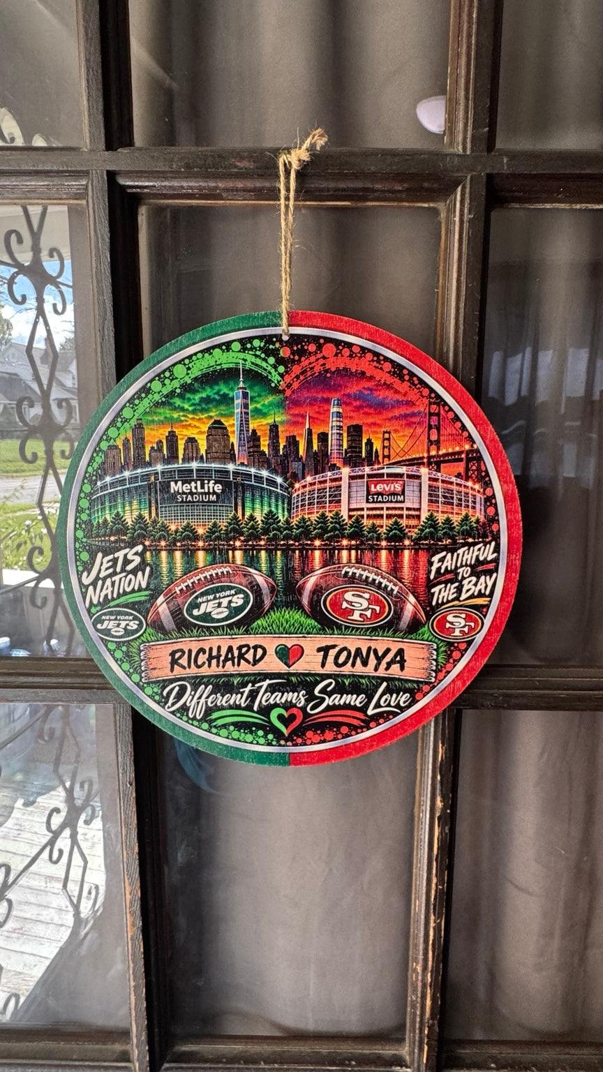 Personalized round wooden football rivalry door sign with two teams and custom names